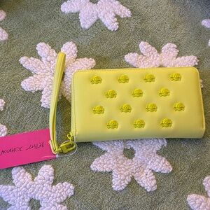 NWT Betsey JohnsonYellow Wristlet with Embossed Logo